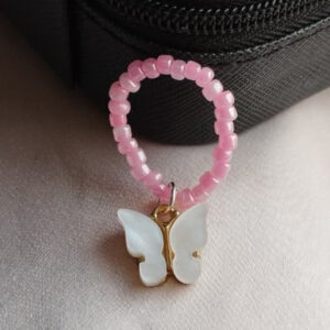 pink beaded butterfly ring.